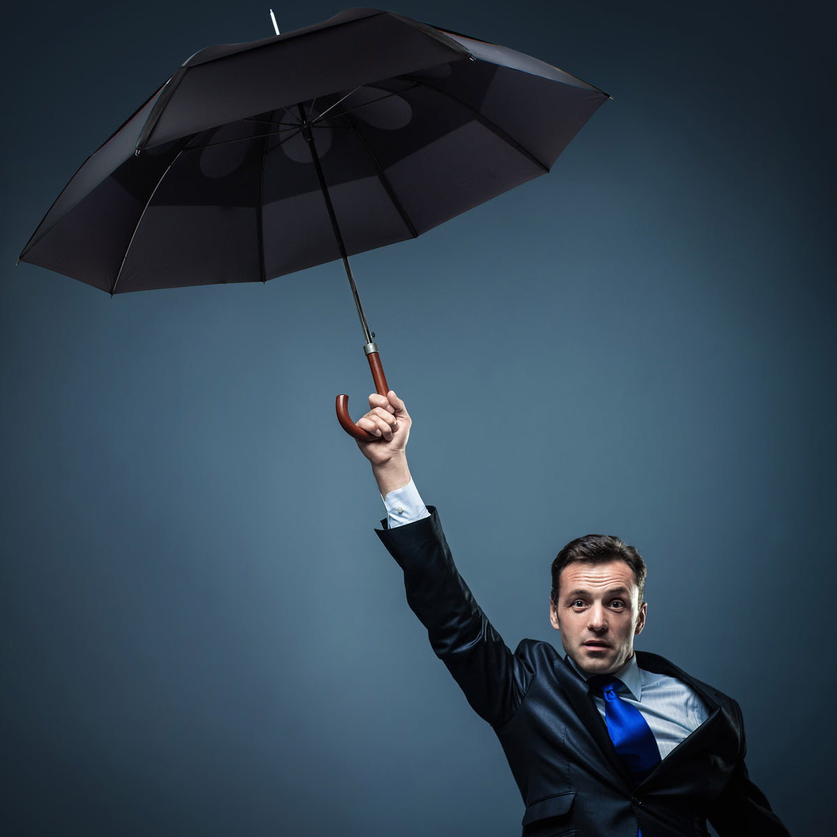 Gustbuster | The World's Smartest Umbrella – GustBuster Umbrellas